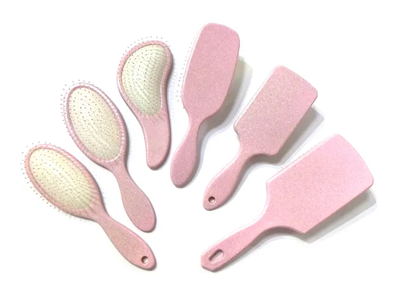 Ružičasta plastična elegantna četka za kosu