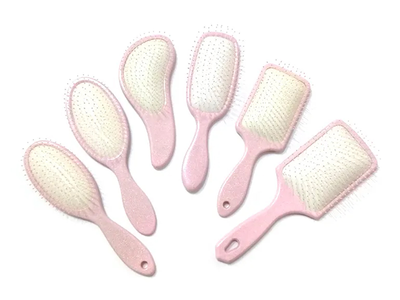 Ružičasta plastična elegantna četka za kosu