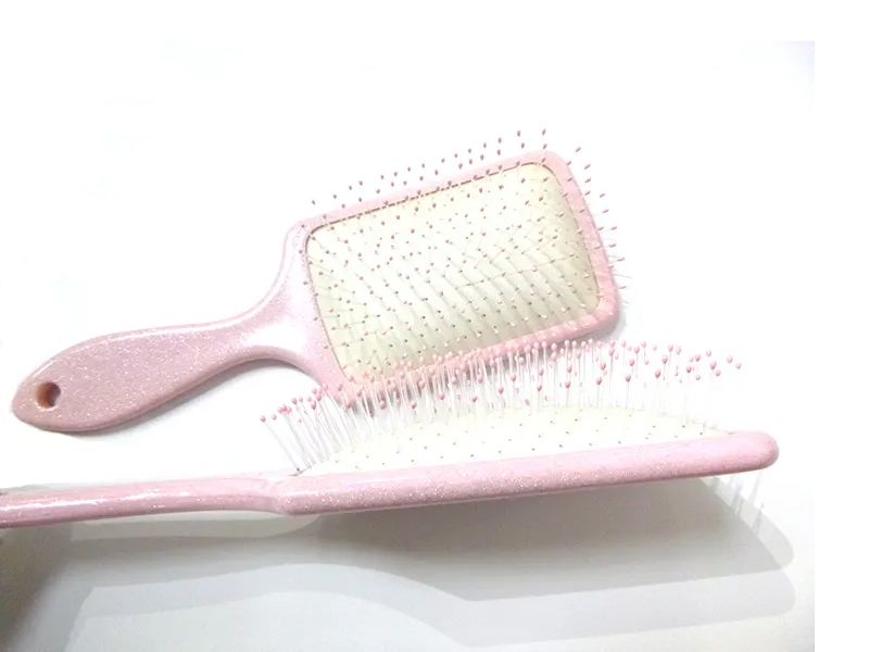 Ružičasta plastična elegantna četka za kosu