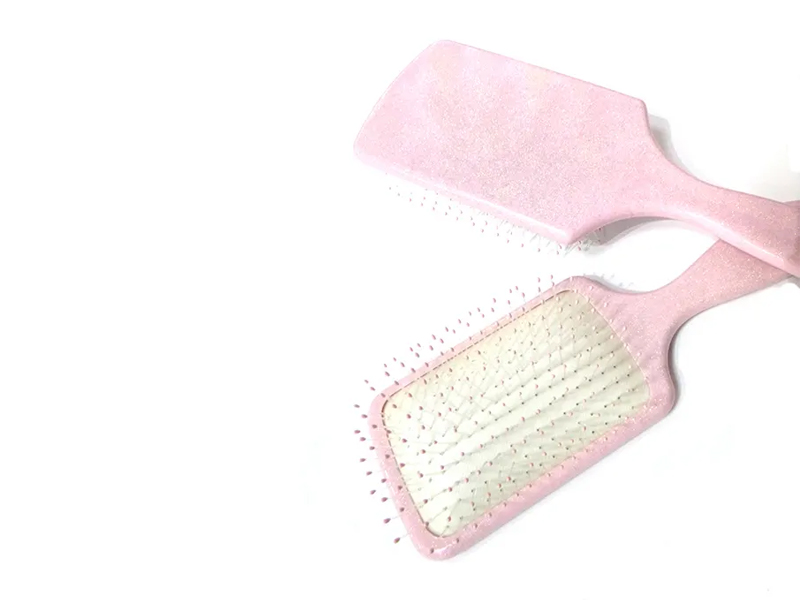 Ružičasta plastična elegantna četka za kosu